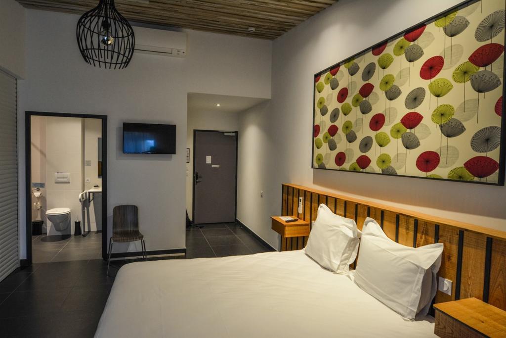 Cit'Hotel Le Relais Du Boisniard Шамбрето Номер фото
